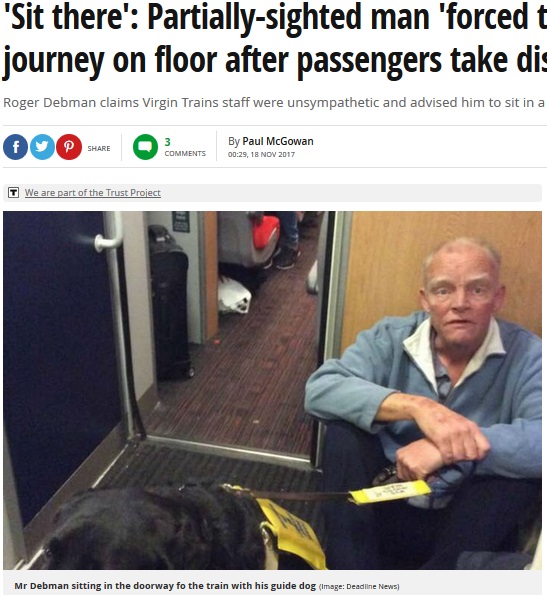電車通路に追いやられた盲導犬と男性（画像は『Mirror　2017年11月18日付「‘Sit there’: Partially-sighted man ‘forced to spend train journey on floor after passengers take disabled seats’」（Image: Deadline News）』のスクリーンショット）