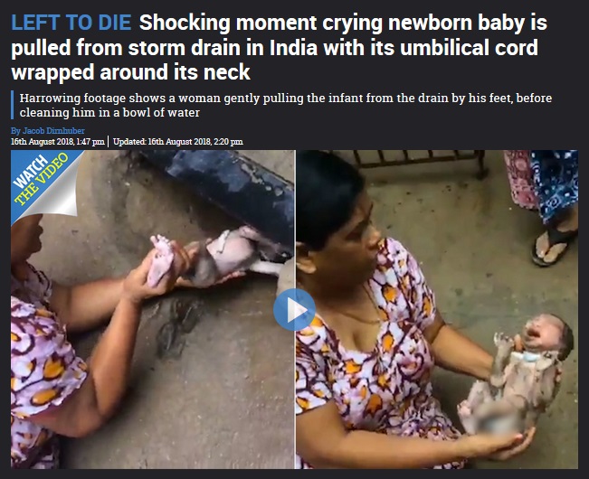 排水溝の中から見つかった新生児（画像は『The Sun　2018年8月16日付「LEFT TO DIE Shocking moment crying newborn baby is pulled from storm drain in India with its umbilical cord wrapped around its neck」』のスクリーンショット）