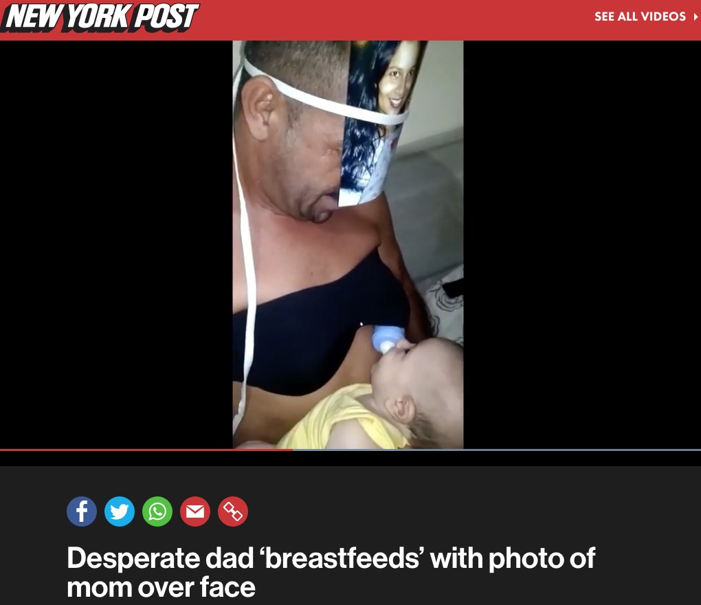 ママの写真を顔に貼り付けたパパ（画像は『New York Post　2019年10月15日付「Desperate dad ‘breastfeeds’ with photo of mom over face」（ViralHog）』のスクリーンショット）