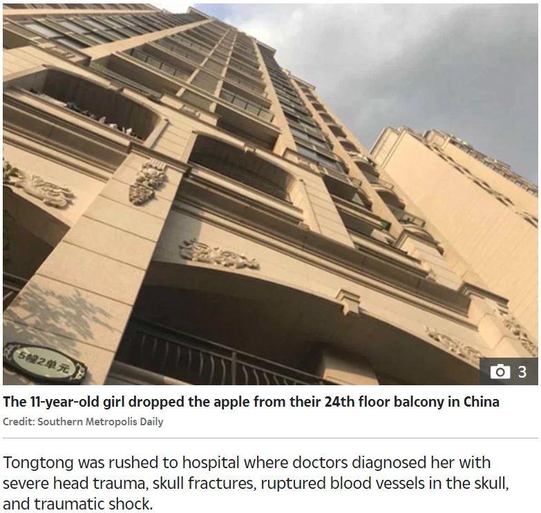 事故があったマンション（画像は『The Sun　2020年4月14日付「FREAK ACCIDENT Girl, 11, leaves toddler in coma when she dropped apple off balcony - as parents are told to pay ￡200k compensation」（Credit: Southern Metropolis Daily）』のスクリーンショット）