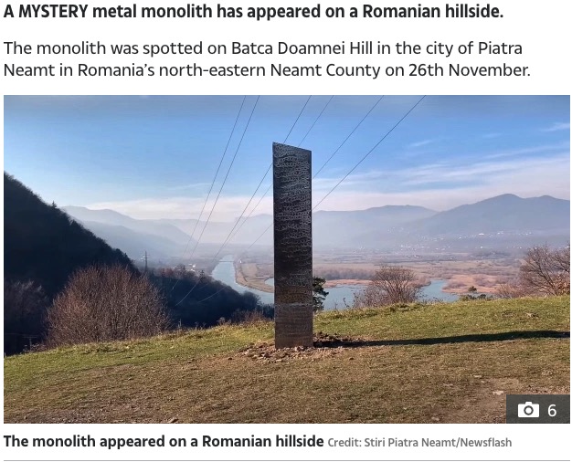 ルーマニアで見つかった謎の金属製の物体（画像は『The Sun　2020年12月1日付「MYSTERY BLOCK Bizarre 13ft ‘alien’ monolith just like one found in Utah desert suddenly appears on Romanian hillside」（Credit: Stiri Piatra Neamt/Newsflash）』のスクリーンショット）