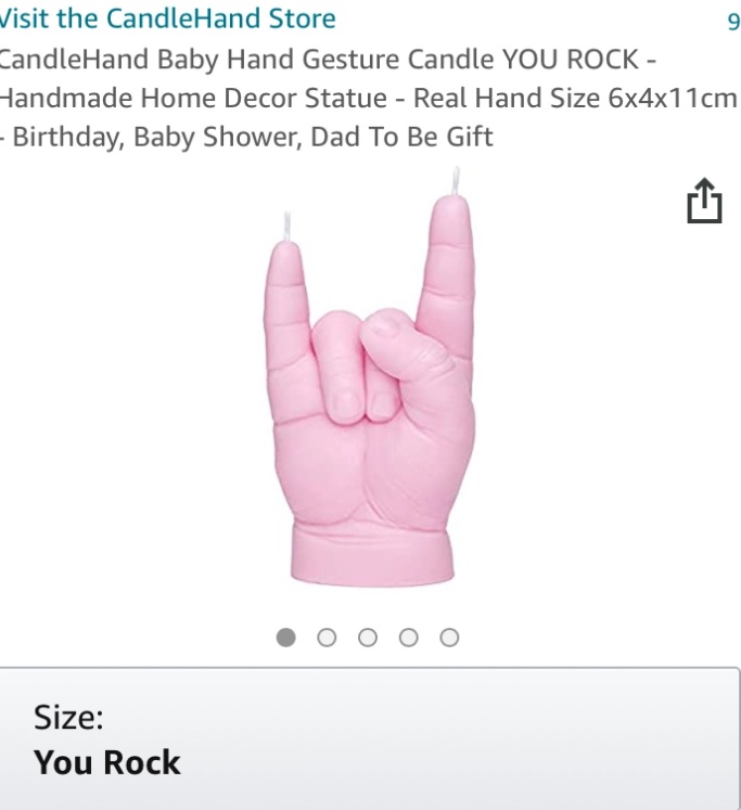 “You rock（最高よ！）”の形をしたポジティブなデザインのキャンドル（画像は『The Sun　2021年1月12日付「RUDEY WAX Girl, 8, sent ‘F*** you’ candle after ordering gift for Covid nurse mum」』のスクリーンショット）