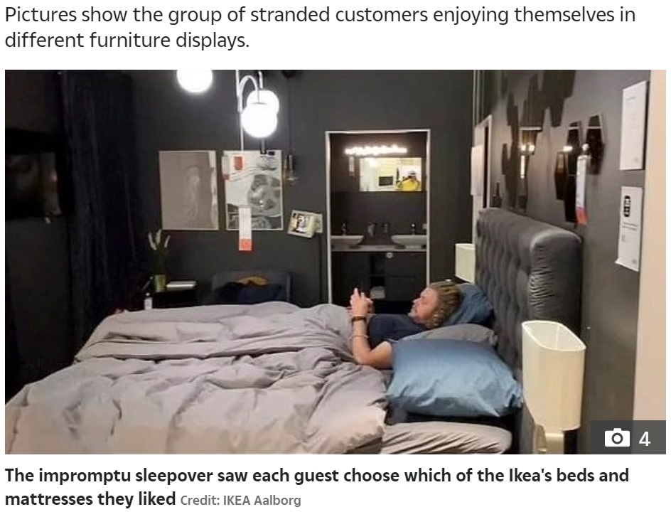 たくさんのベッドの中から好きなベッドを選んで眠る人々（画像は『The Sun　2021年12月3日付「SCANDI PLACE FOR A SLEEPOVER IKEA customers forced to bed down in store’s showroom after being SNOWED in」（Credit: IKEA Aalborg）』のスクリーンショット）