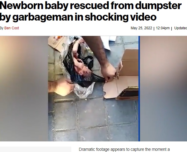 体を動かす赤ちゃん（画像は『New York Post　2022年5月25日付「Newborn baby rescued from dumpster by garbageman in shocking video」（Newsflash）』のスクリーンショット）