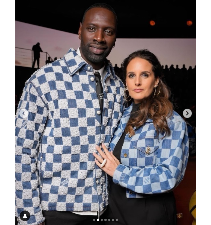 オマール・シーと妻のエレーヌ・シー。色違いのモノグラムのジャケットを羽織っていた（画像は『Omar Sy　2024年1月18日付Instagram「Louis Vuitton FW 24-25 Mens Show」』のスクリーンショット）
